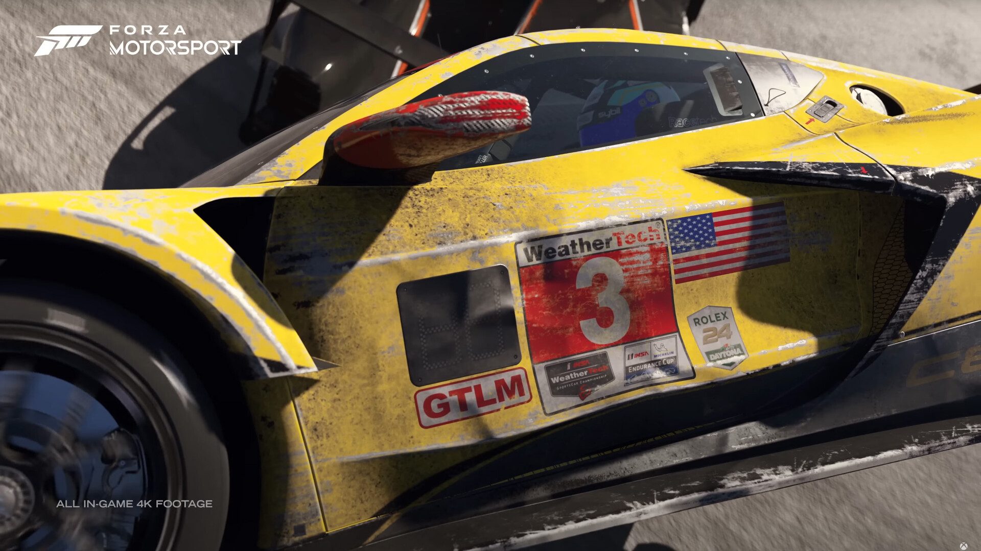 Forza Motorsport - Xbox Showcase 2022: Notice the side mirror, as it is damaged, the base carbon fiber is exposed.